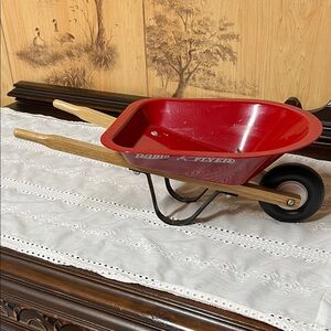 Red Wheelbarrow with Wooden Handles